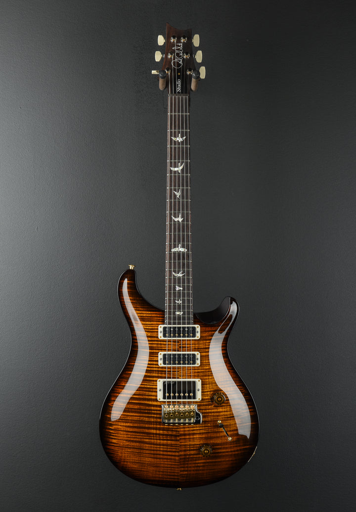 Studio 10 Top - Black Gold Wraparound Burst